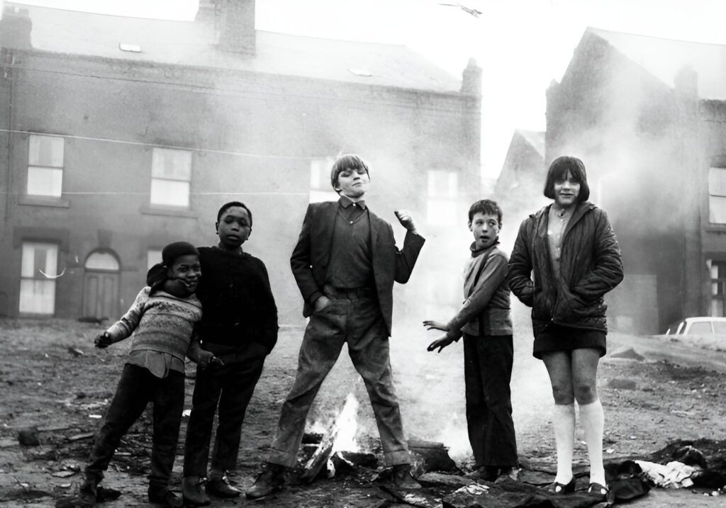 "Butch & Mates" in front of properties in Servia Hill, Woodhouse (1970). Credit: Leeds Libraries, www.leodis.net