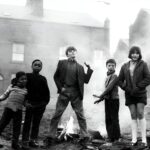 "Butch & Mates" in front of properties in Servia Hill, Woodhouse (1970). Credit: Leeds Libraries, www.leodis.net